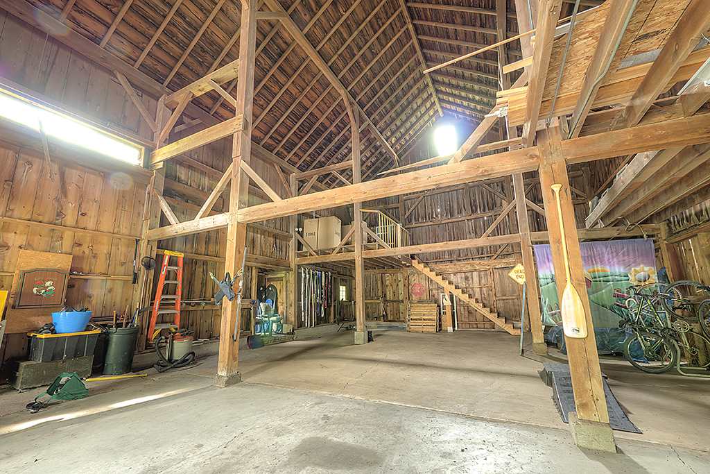 8395 Spring Brook Road Rockford, IL 61114 - Photo 21 of 24 a view of a room with wooden walls