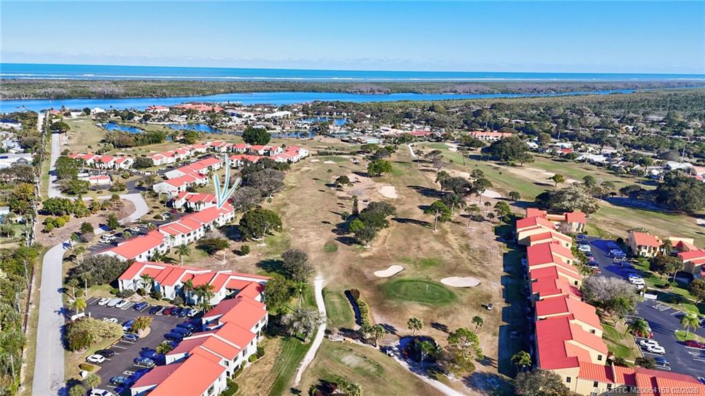 5413 Southeast Miles Grant Road, Unit G206 Stuart, FL 34997 - Photo 66 of 79 an aerial view of a city