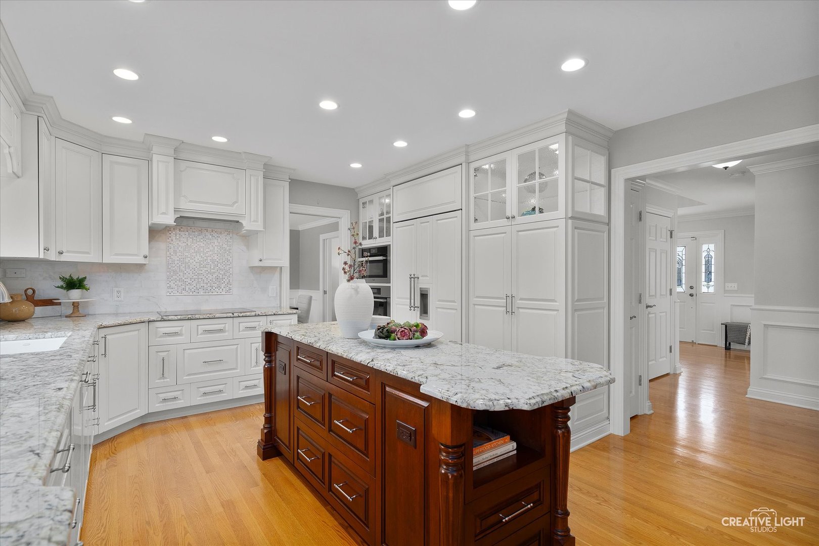 1454 Rill Court Naperville, IL 60565 - Photo 11 of 58 a kitchen with stainless steel appliances granite countertop a sink a stove and a refrigerator