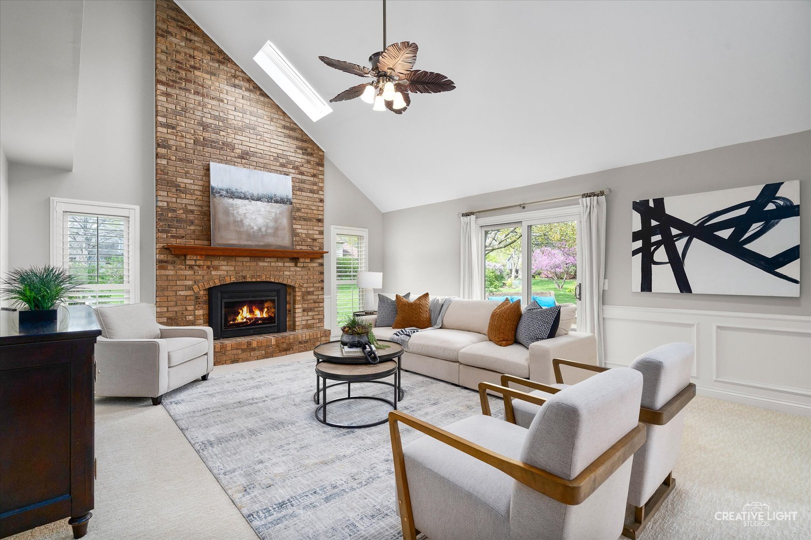 1454 Rill Court Naperville, IL 60565 - Photo 19 of 58 a living room with furniture and a fireplace