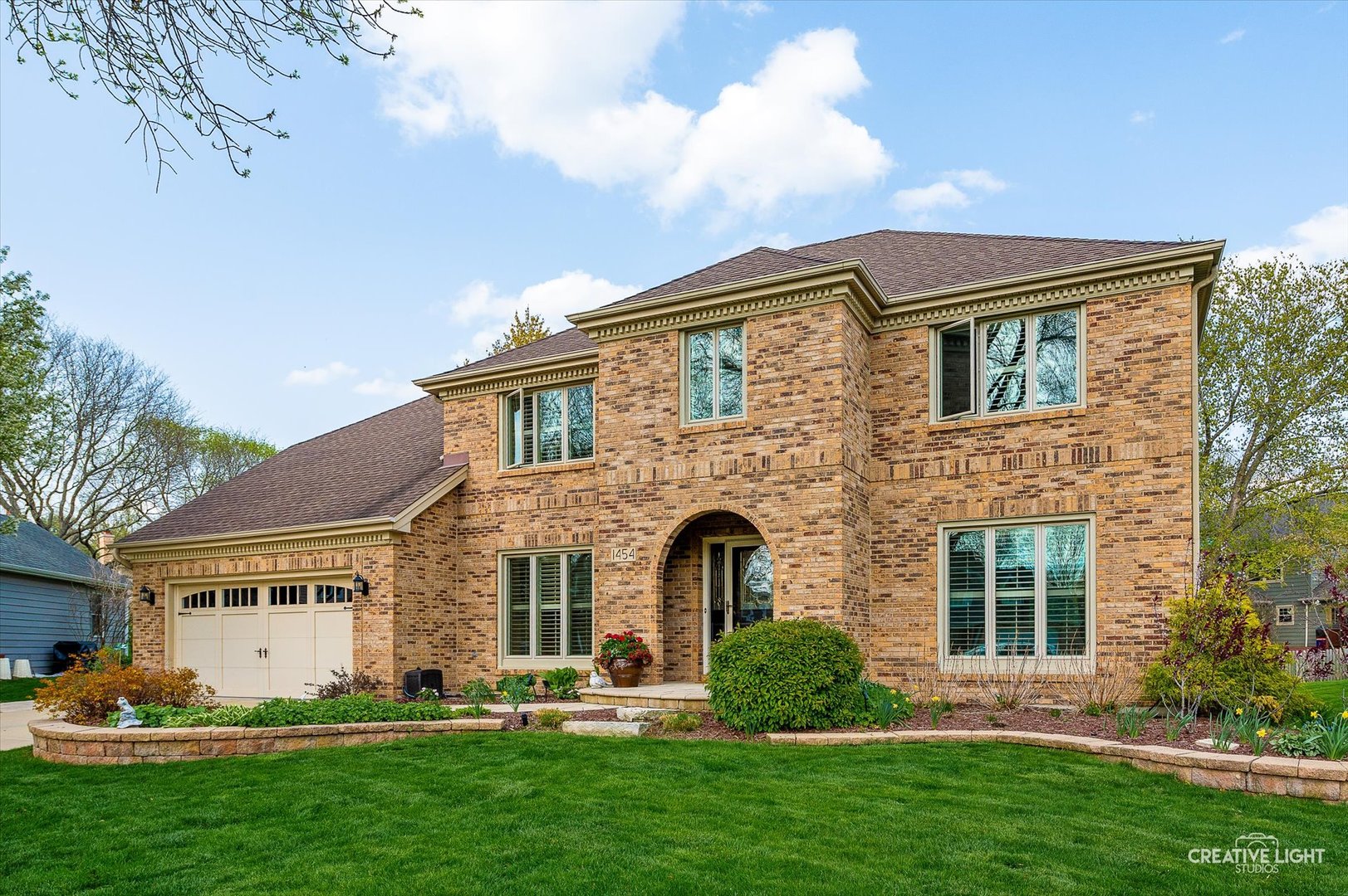 1454 Rill Court Naperville, IL 60565 - Photo 2 of 58 front view of a house with a yard