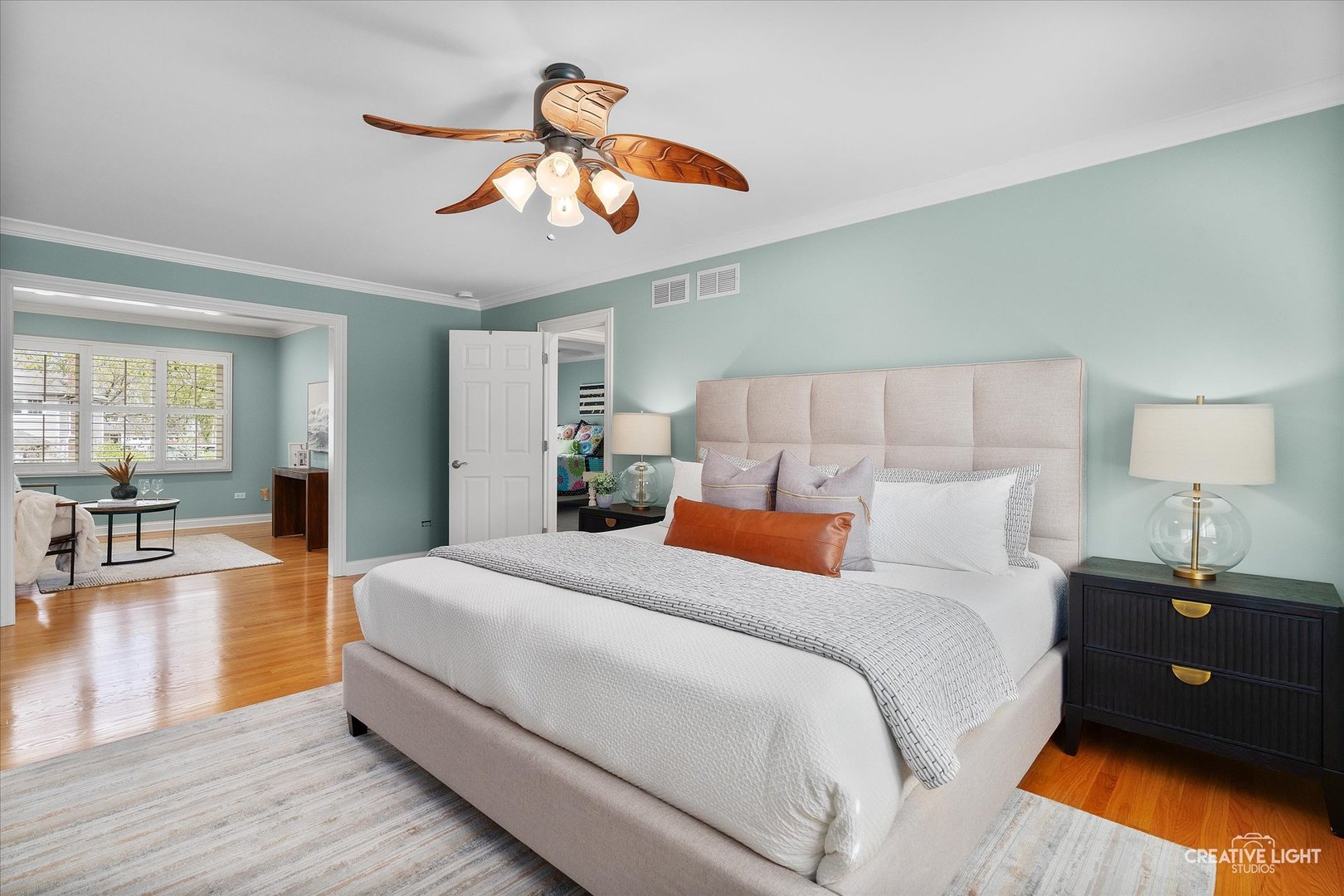 1454 Rill Court Naperville, IL 60565 - Photo 25 of 58 a bedroom with a bed and wooden floor