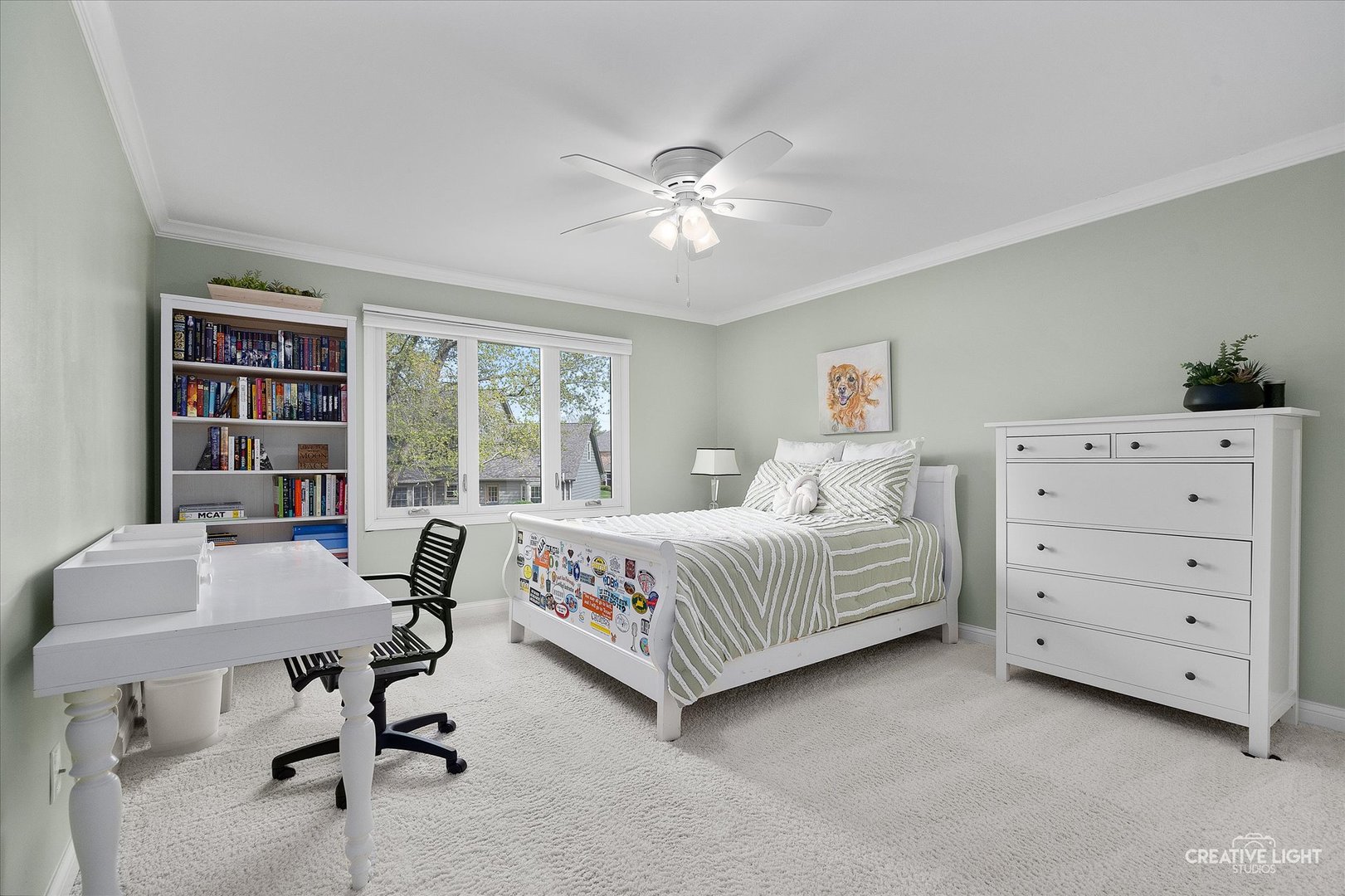 1454 Rill Court Naperville, IL 60565 - Photo 31 of 58 a bedroom with a bed and a table in it