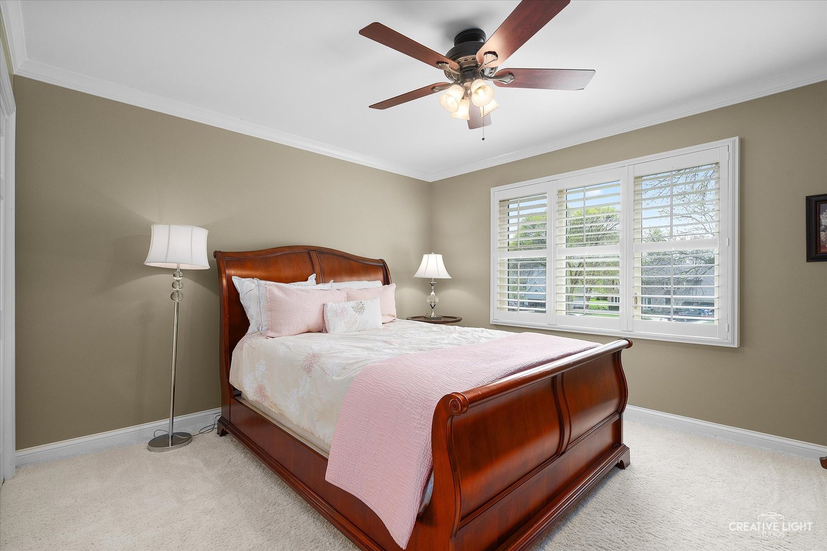 1454 Rill Court Naperville, IL 60565 - Photo 32 of 58 a bed sitting in a bedroom next to a window