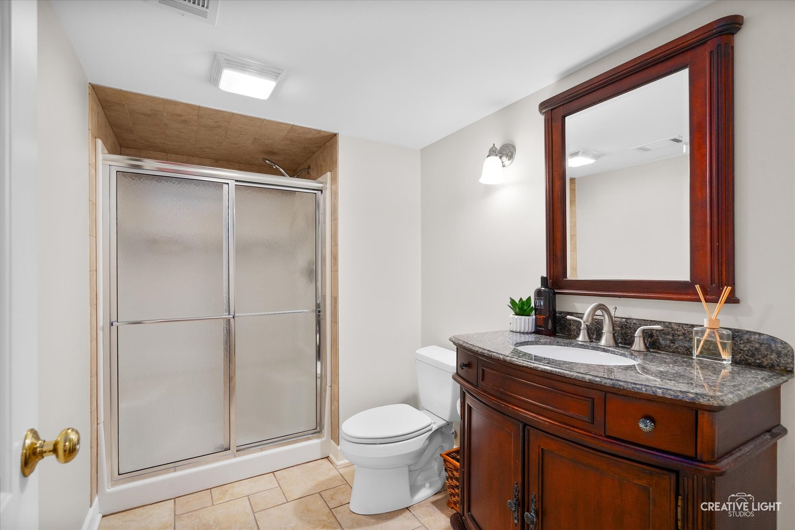 1454 Rill Court Naperville, IL 60565 - Photo 40 of 58 a bathroom with a sink toilet and mirror