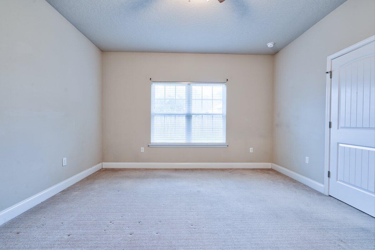 4614 Hermosa Road Crestview, FL 32539 - Photo 19 of 23 an empty room with a window