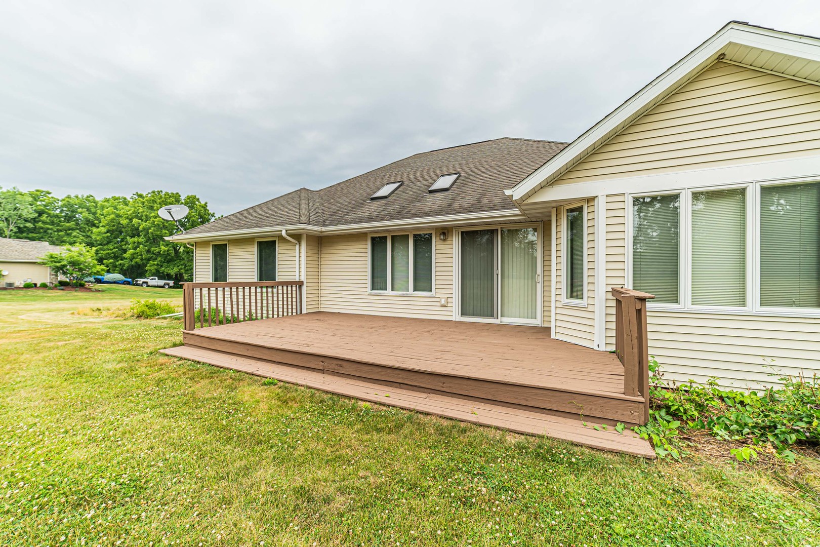2113 Grand Detour Road Dixon, IL 61021 - Photo 23 of 35 a front view of a house with a yard