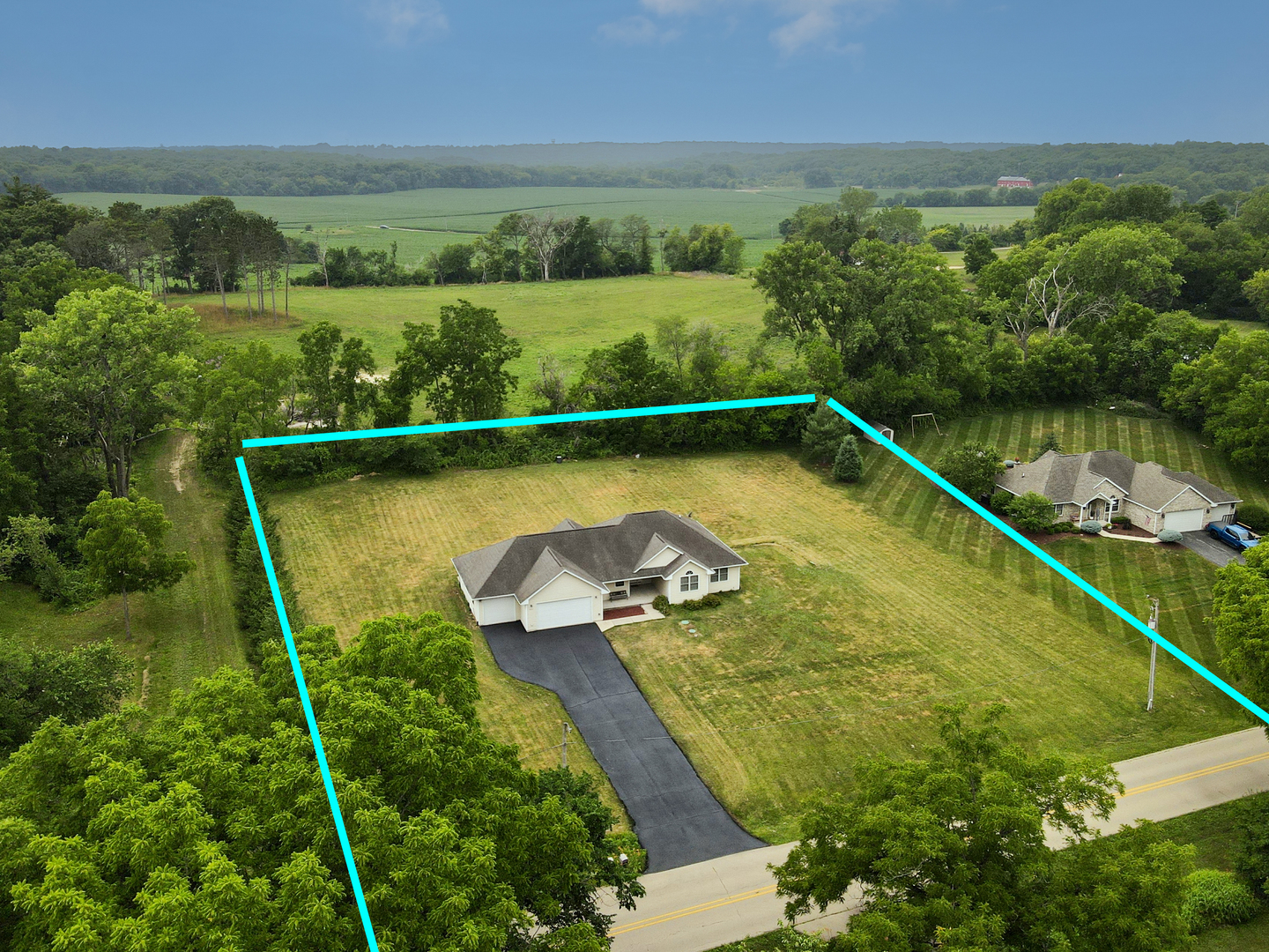 2113 Grand Detour Road Dixon, IL 61021 - Photo 28 of 35 an aerial view of a house with a swimming pool outdoor seating and yard