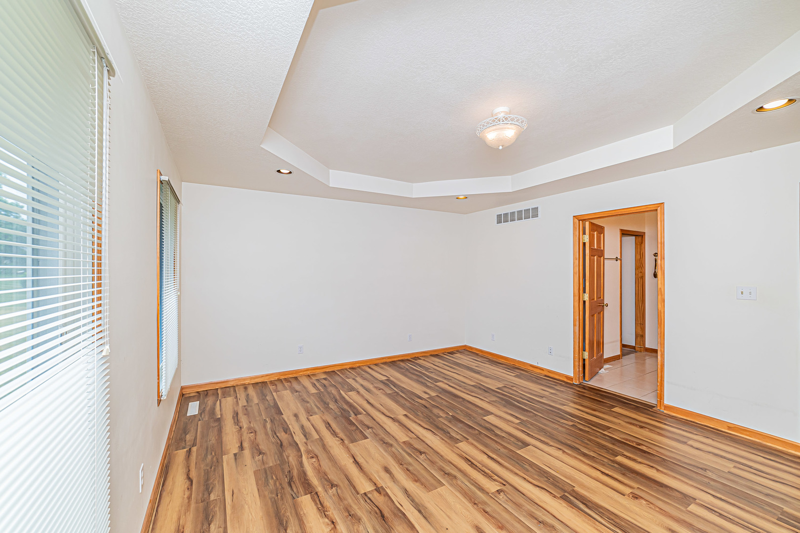 2113 Grand Detour Road Dixon, IL 61021 - Photo 7 of 35 a view of empty room with wooden floor