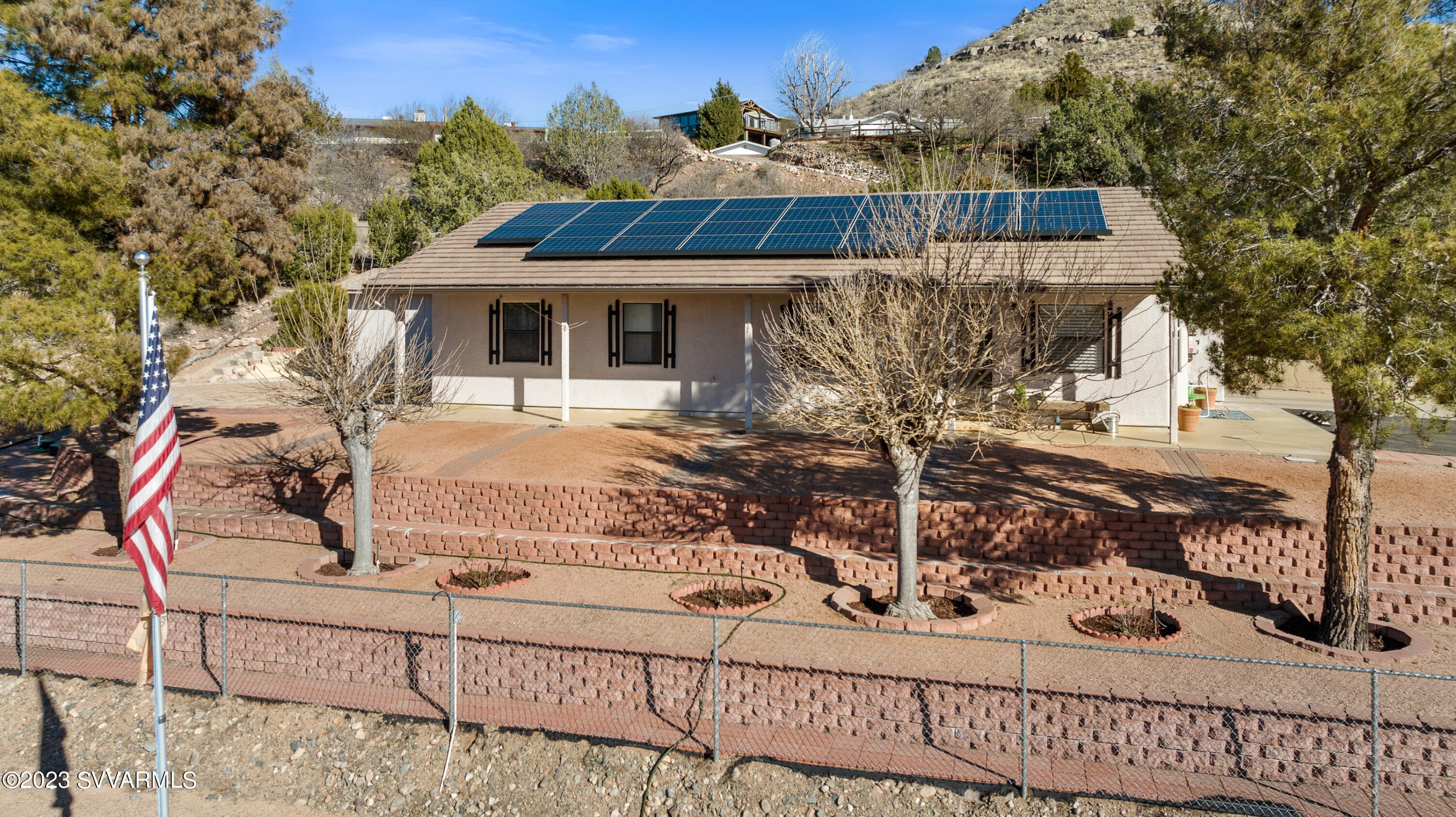 4270 Maya Way Rimrock, AZ 86335 - Photo 2 of 32 a view of a house with wooden fence