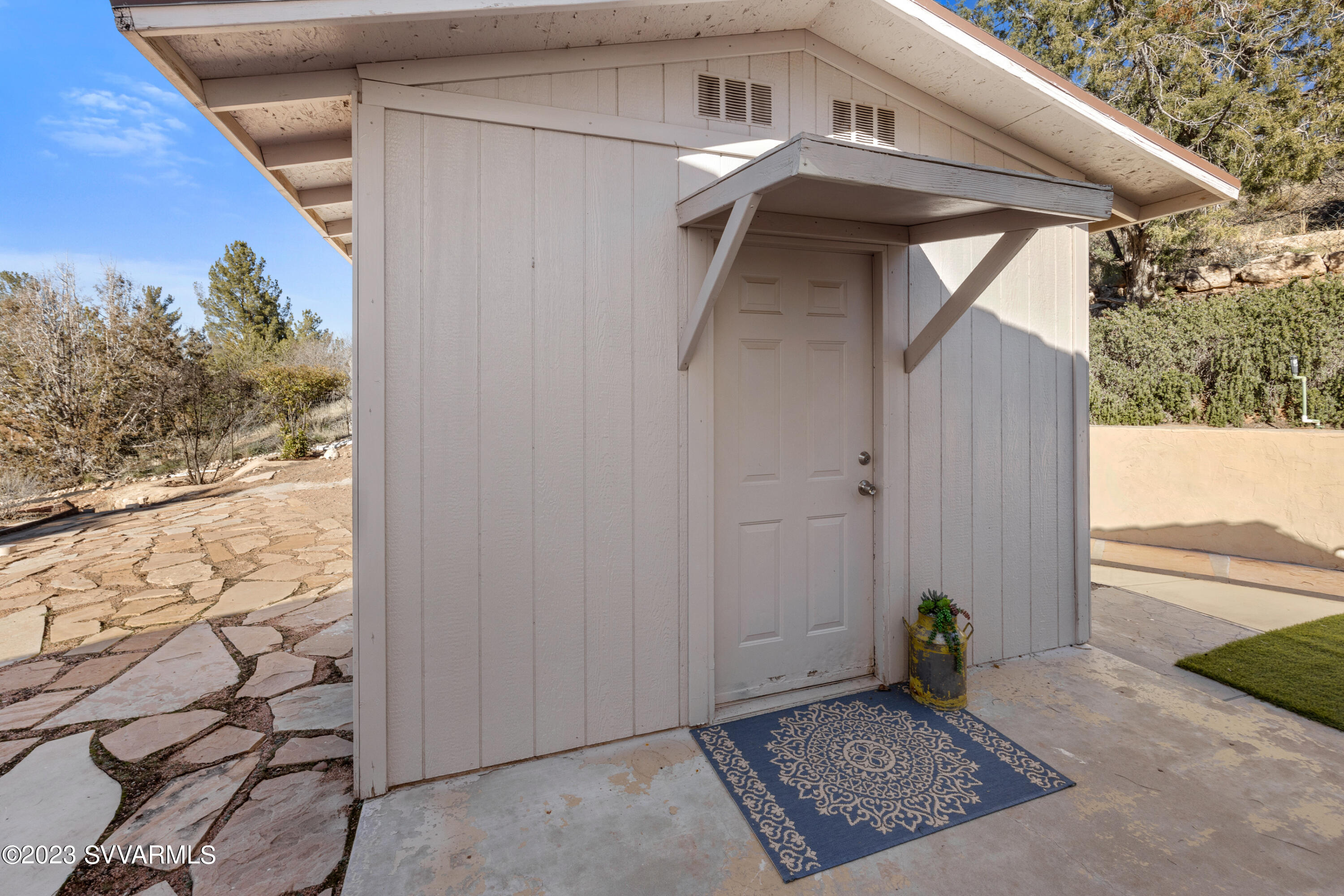 4270 Maya Way Rimrock, AZ 86335 - Photo 26 of 32 a view of a wooden door and a window