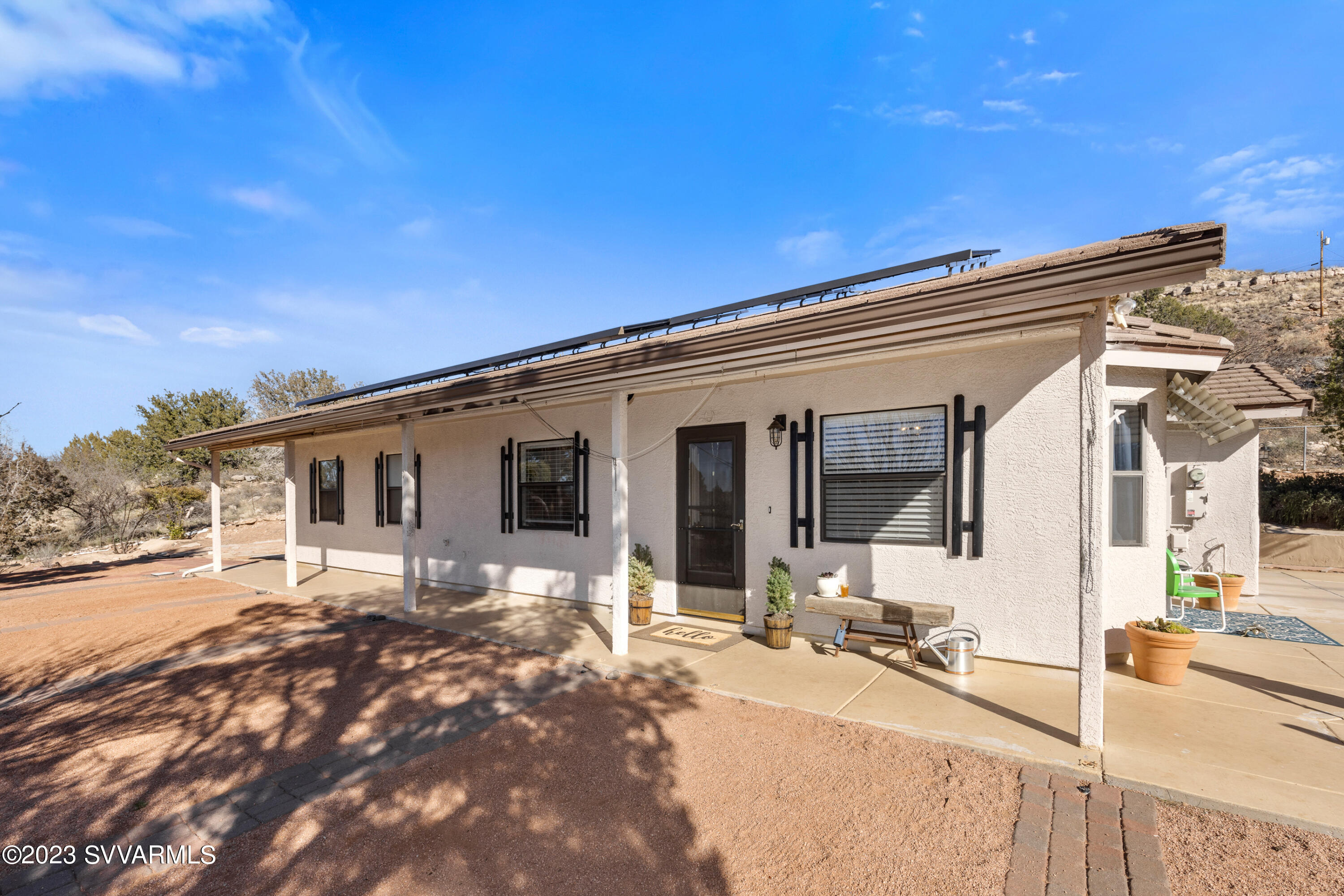 4270 Maya Way Rimrock, AZ 86335 - Photo 3 of 32 a front view of a house with a patio