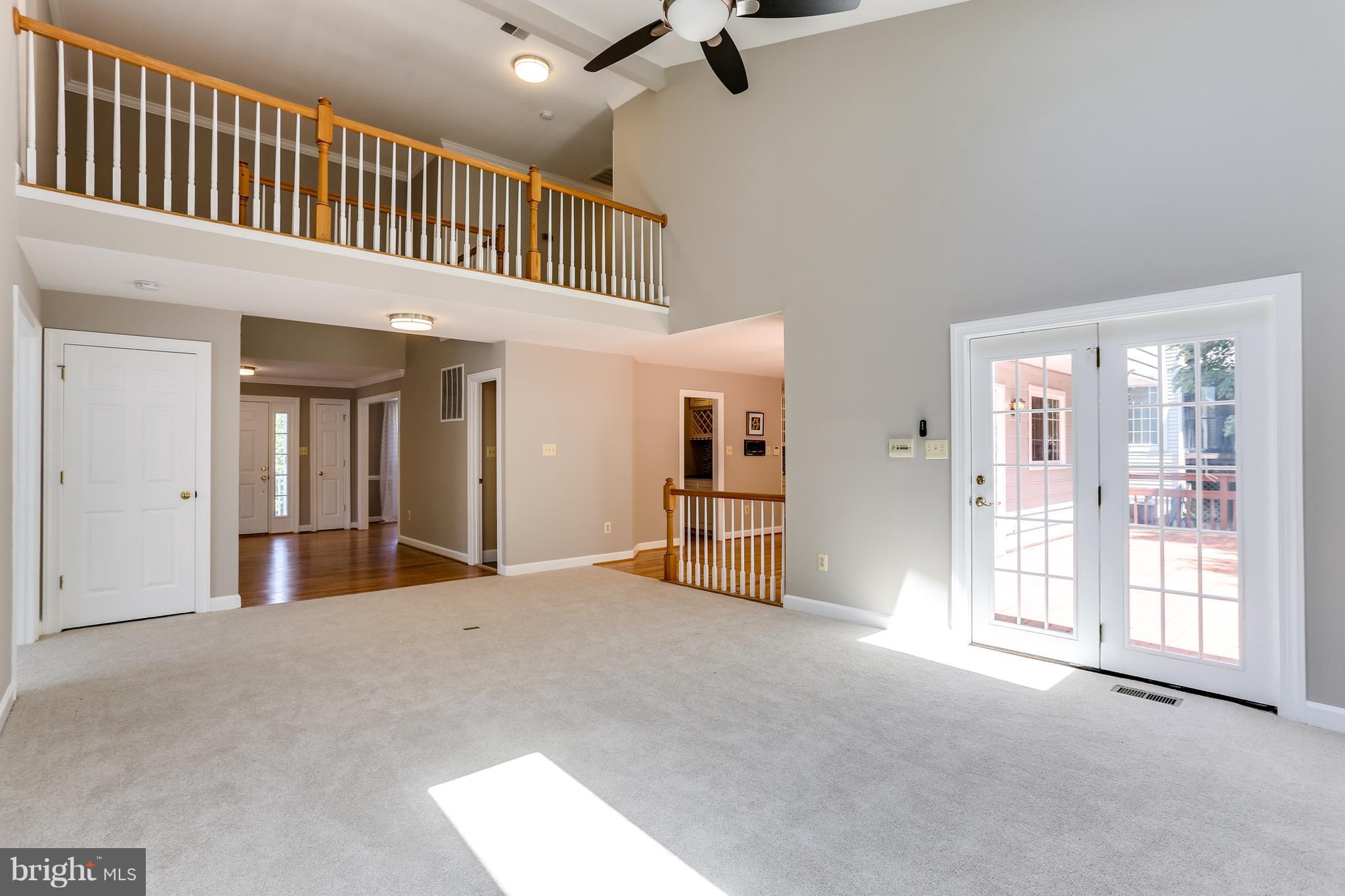 8394 Autumn Rust Road Ellicott City, MD 21043 - Photo 16 of 30 Family room overlooking large deck.