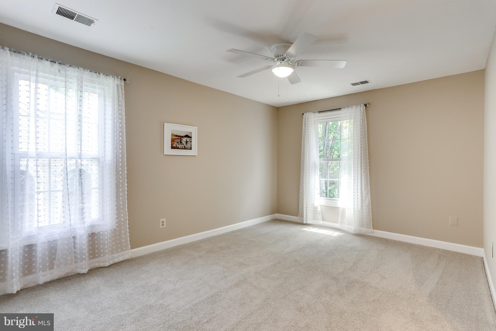 8394 Autumn Rust Road Ellicott City, MD 21043 - Photo 17 of 30 Bedroom with beautiful views of trees
