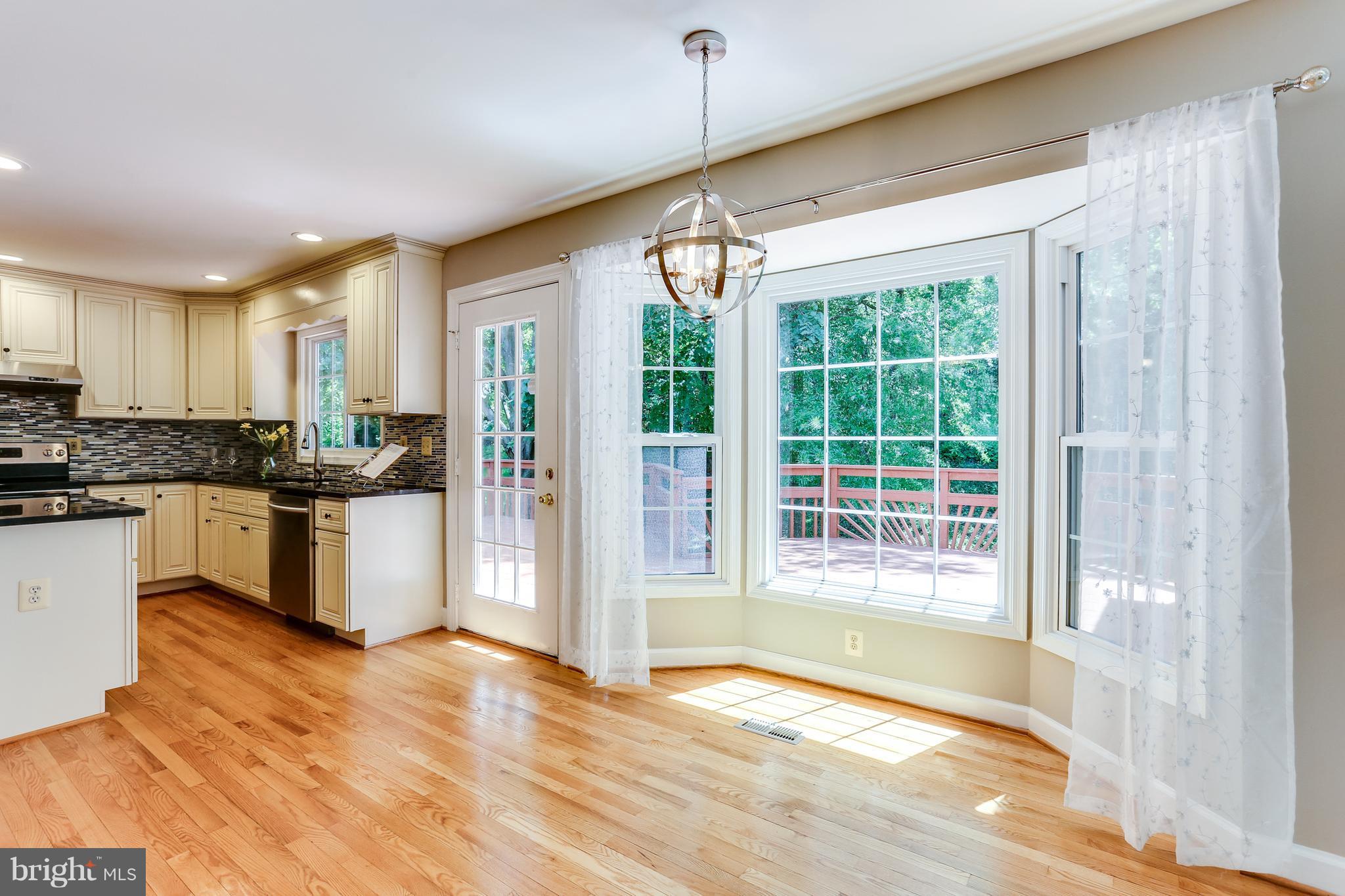 8394 Autumn Rust Road Ellicott City, MD 21043 - Photo 7 of 30 Stunning kitchen, French doors, beautiful views