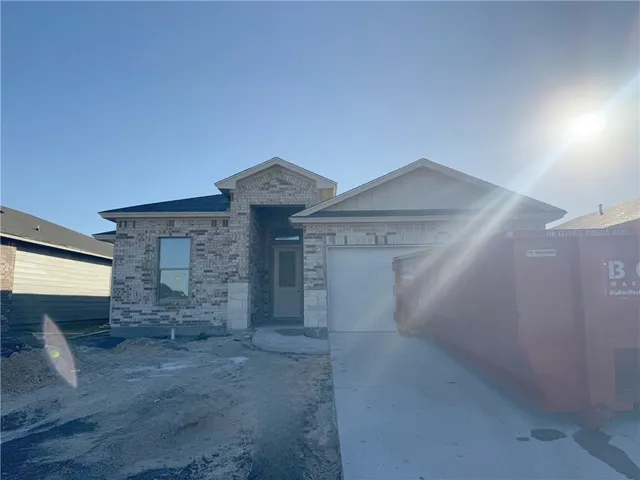 a view of empty room with windows