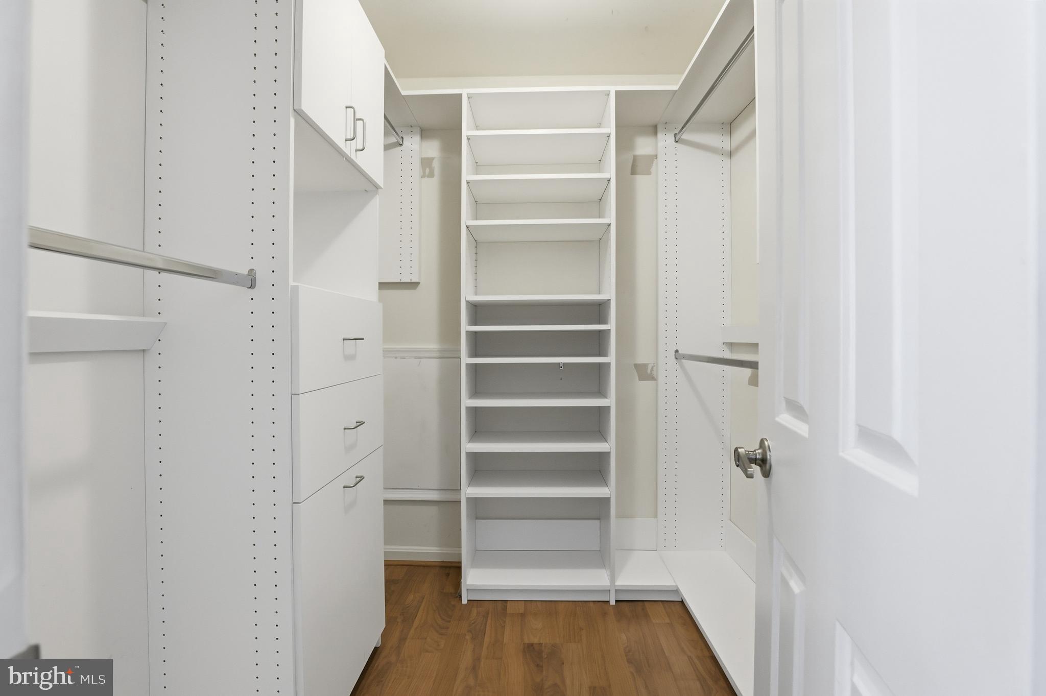 14740 Locustwood Lane Silver Spring, MD 20905 - Photo 24 of 46 a view of walk in closet with empty racks