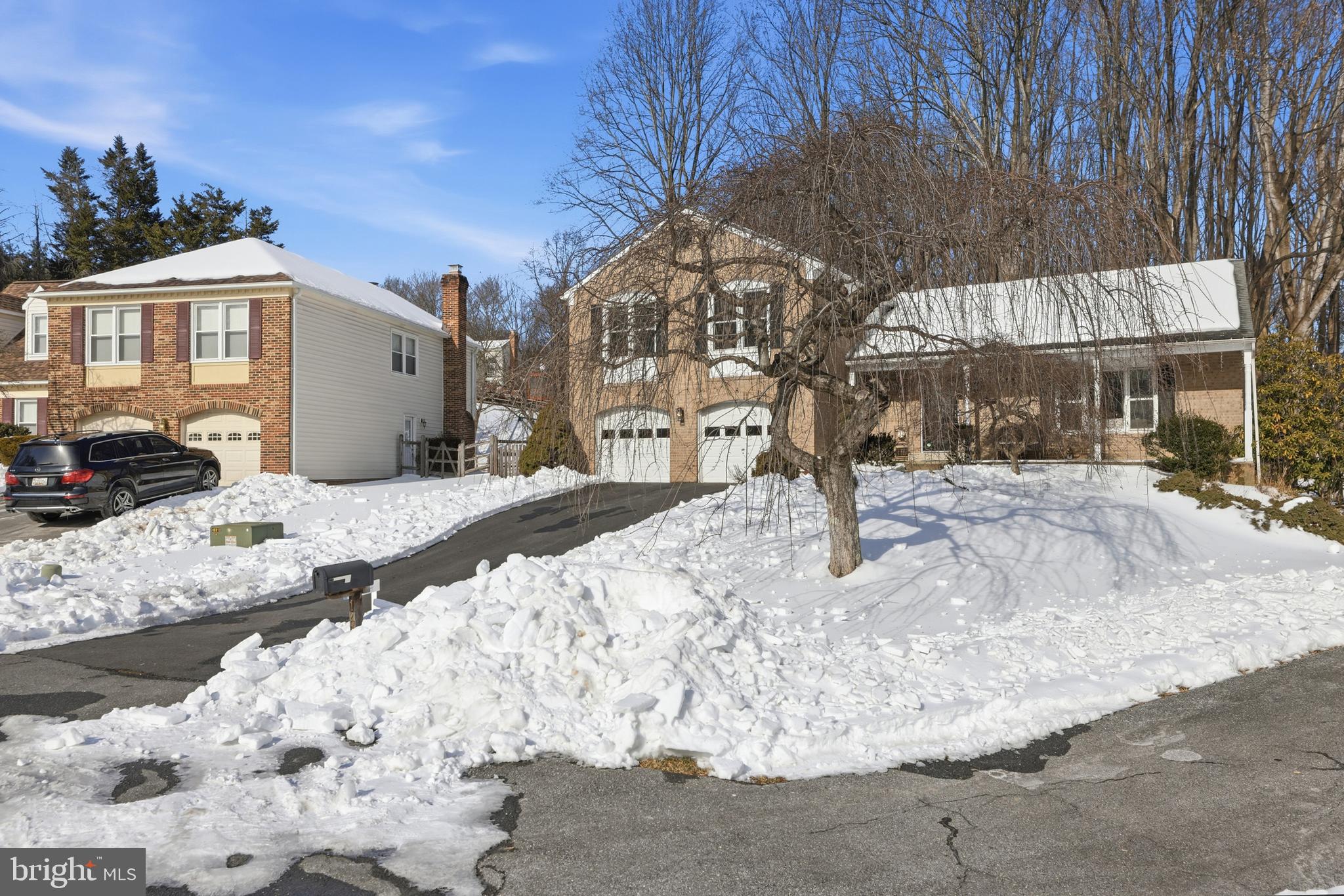 14740 Locustwood Lane Silver Spring, MD 20905 - Photo 3 of 46 a view of street with large trees