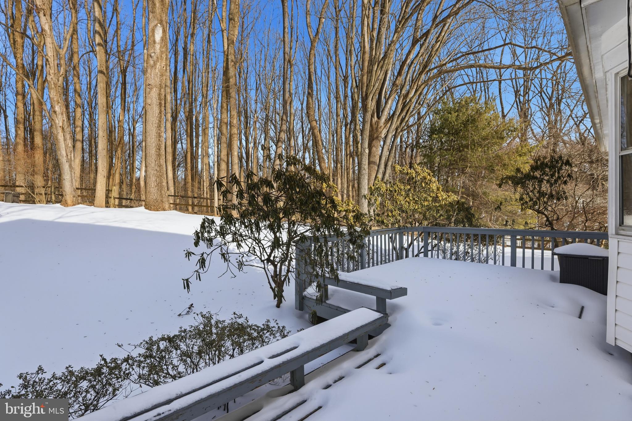 14740 Locustwood Lane Silver Spring, MD 20905 - Photo 31 of 46 a view of balcony with wooden fence and trees