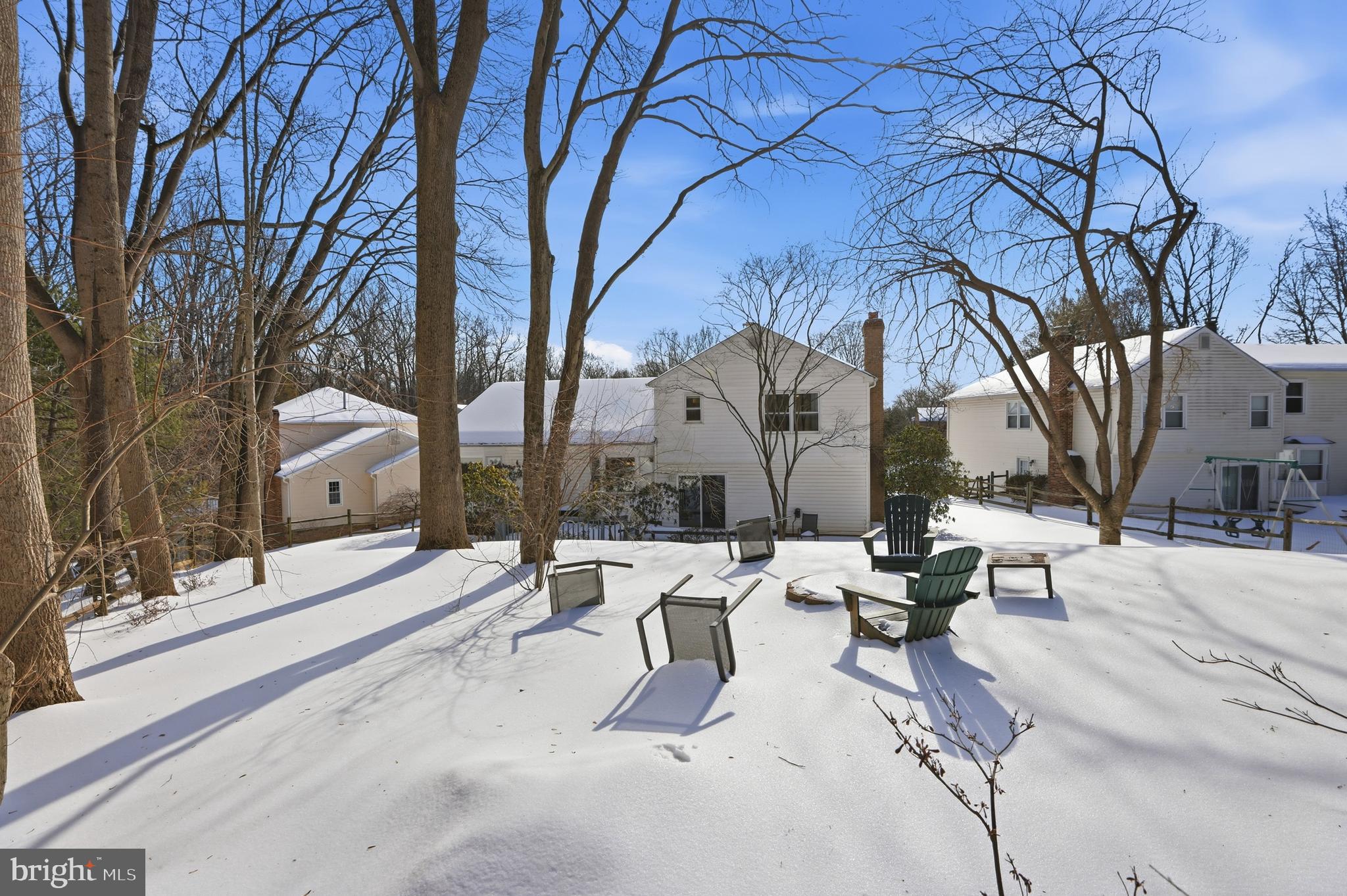 14740 Locustwood Lane Silver Spring, MD 20905 - Photo 34 of 46 a row of palm trees in front of house