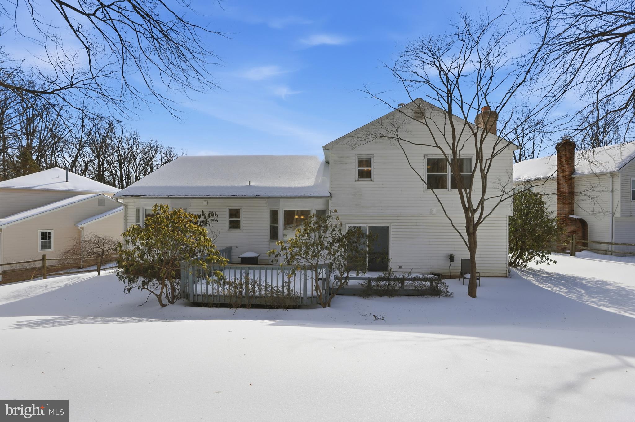 14740 Locustwood Lane Silver Spring, MD 20905 - Photo 35 of 46 a front view of a house with garden