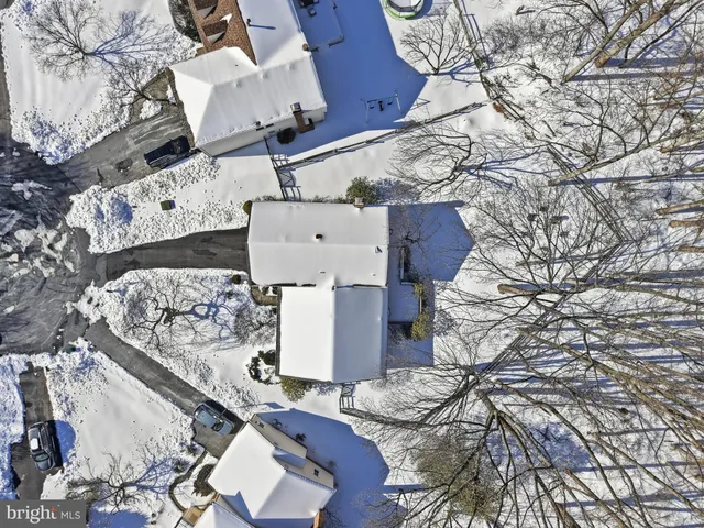 an aerial view of residential house with outdoor space