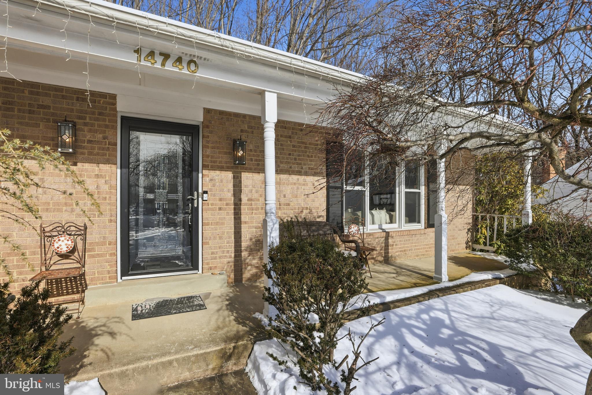 14740 Locustwood Lane Silver Spring, MD 20905 - Photo 4 of 46 a front view of a house with a yard