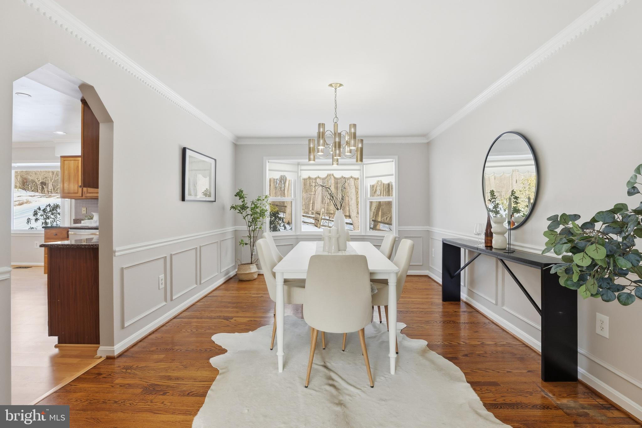 14740 Locustwood Lane Silver Spring, MD 20905 - Photo 9 of 46 a view of a dining room with furniture window and wooden floor