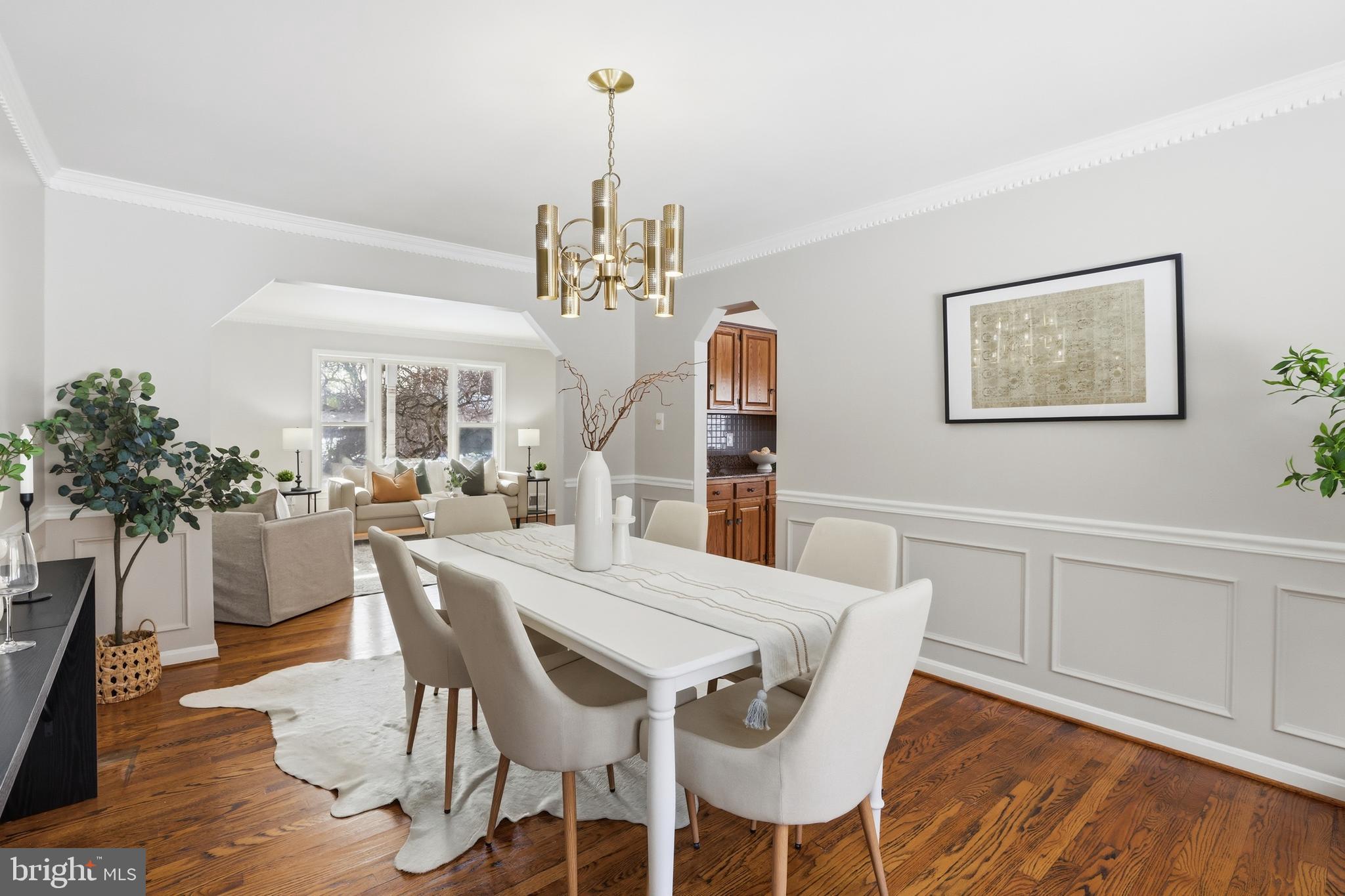 14740 Locustwood Lane Silver Spring, MD 20905 - Photo 10 of 46 a view of a dining room with furniture and wooden floor