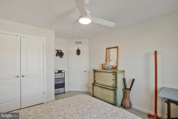 a view of kitchen with furniture and wooden floor