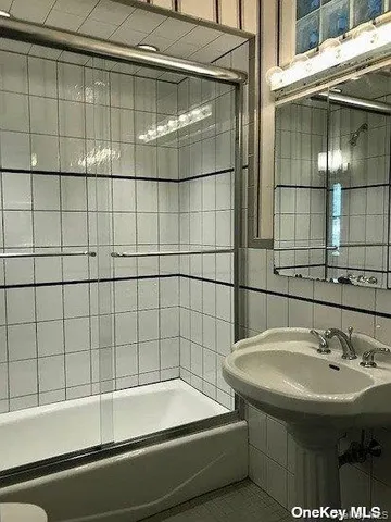 a bathroom with a sink and a bathtub