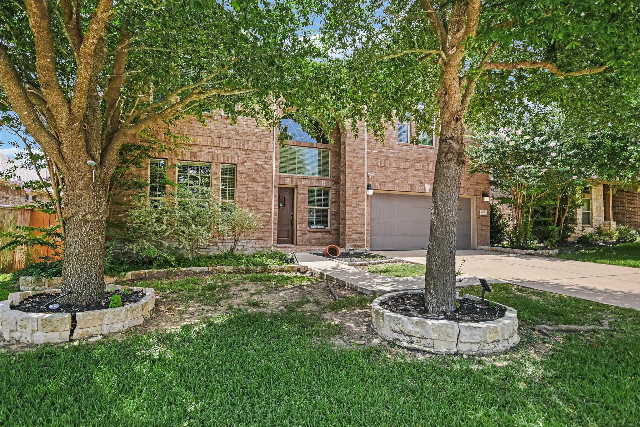 4623 Chestnut Meadows Bend Georgetown, TX 78626 - Photo 1 of 30 a front view of a house with a yard and fountain