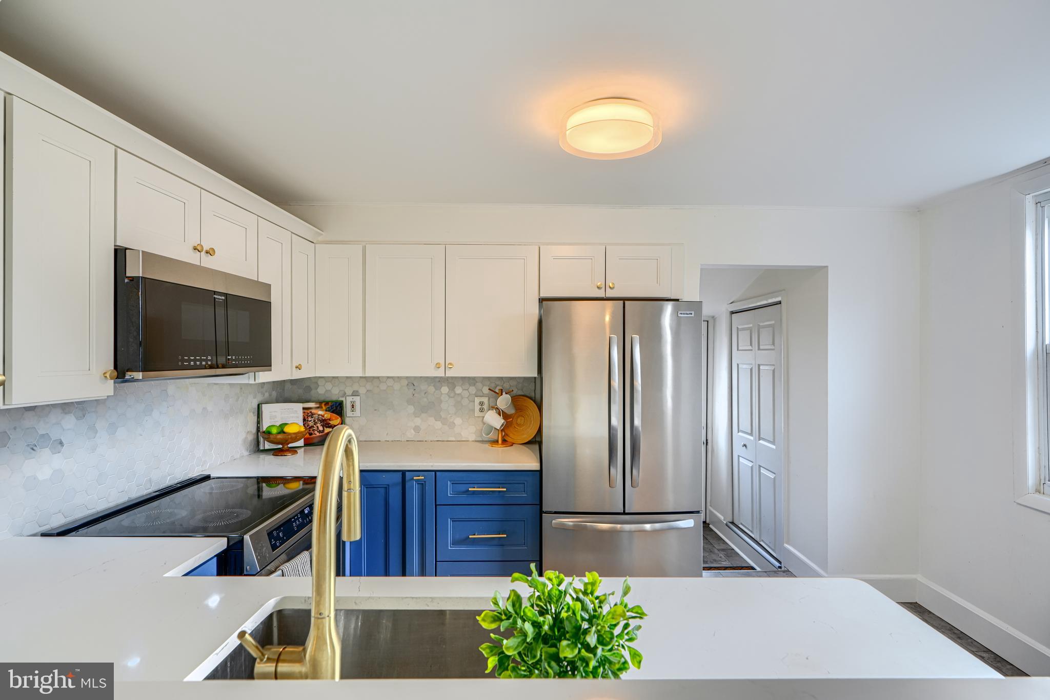 4511 Keswick Road Baltimore, MD 21210 - Photo 29 of 78 Kitchen with brass fixtures