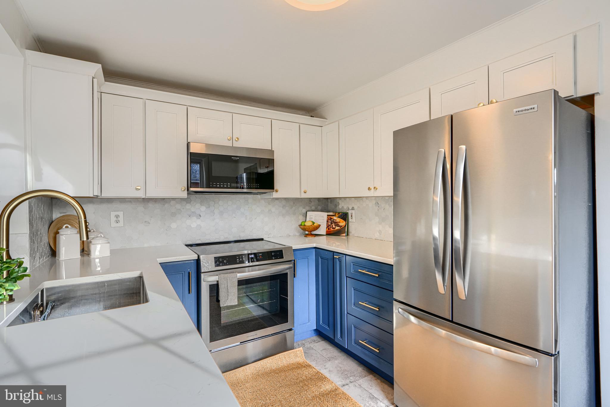 4511 Keswick Road Baltimore, MD 21210 - Photo 33 of 78 Stainless built-in microwave and refrigerator