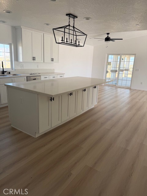 16925 Nanticoke Road Apple Valley, CA 92307 - Photo 22 of 87 a view of a kitchen with wooden floor