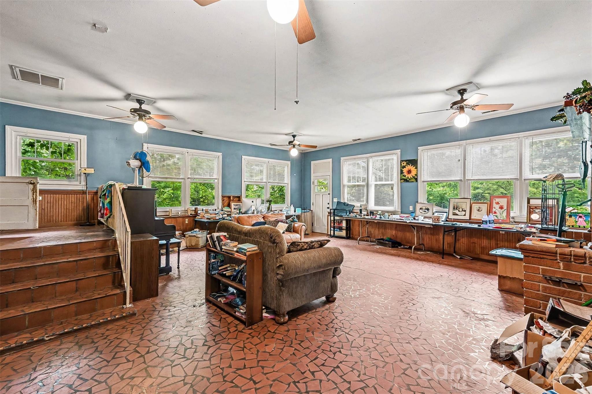 1116 Medlin Road Monroe, NC 28112 - Photo 5 of 40 a living room with furniture and a large window