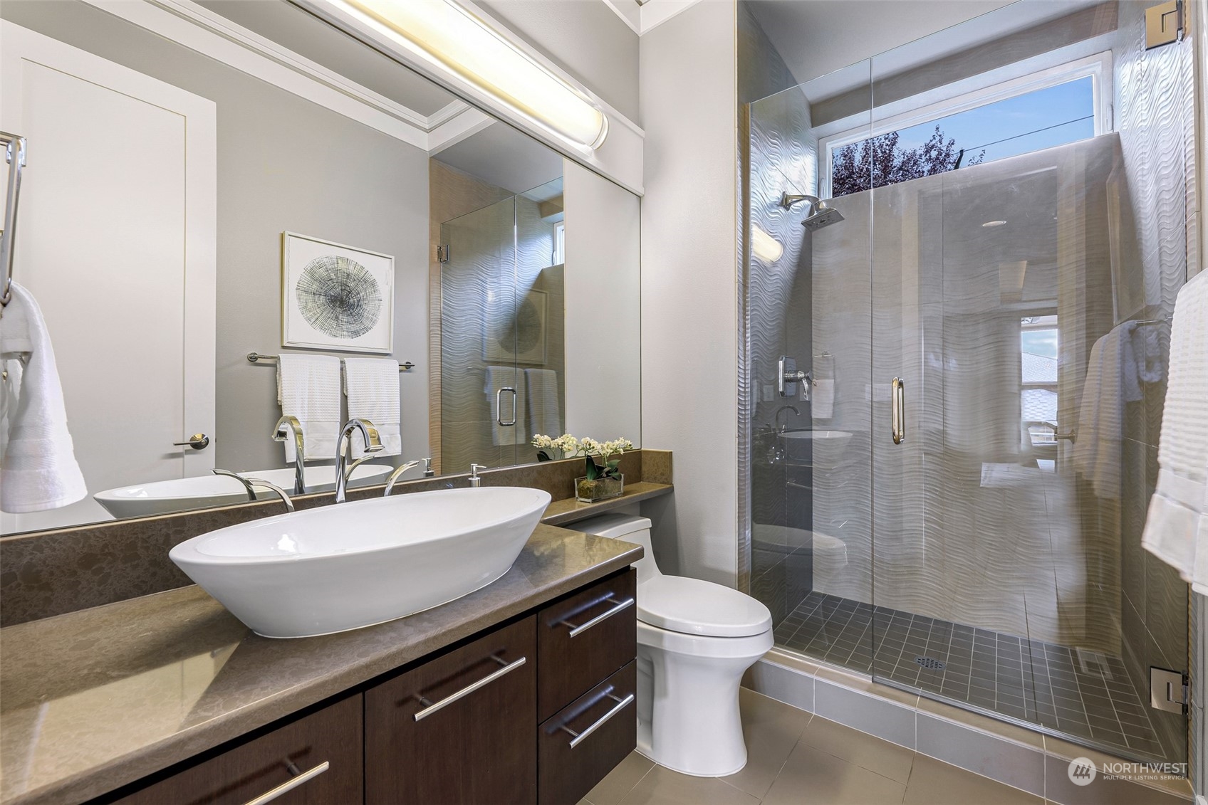 925 3rd Street West Kirkland, WA 98033 - Photo 16 of 40 a bathroom with a granite countertop sink toilet a mirror and shower