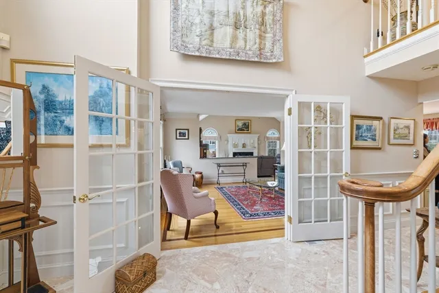 a view of a livingroom with furniture and a window