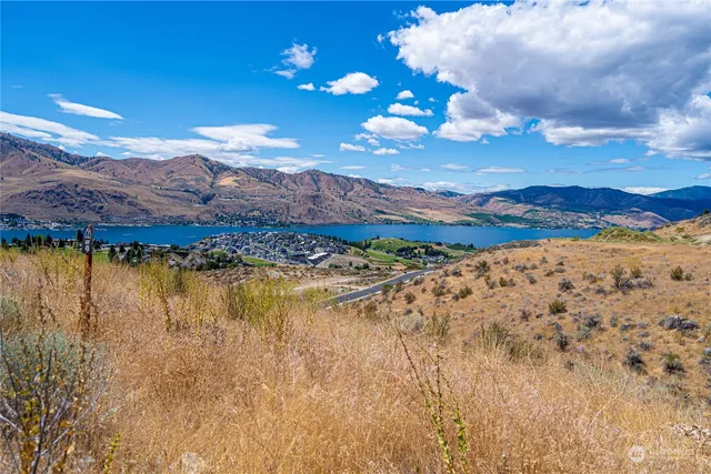 a view of a lake with mountains in the background