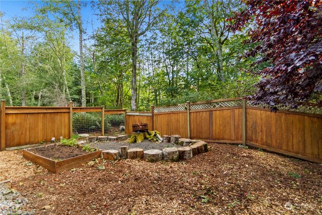 a view of house with balcony