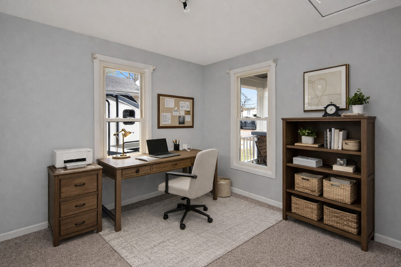 615 North Mulberry Street Clinton, IL 61727 - Photo 21 of 40 a view of a workspace with a window and shelf