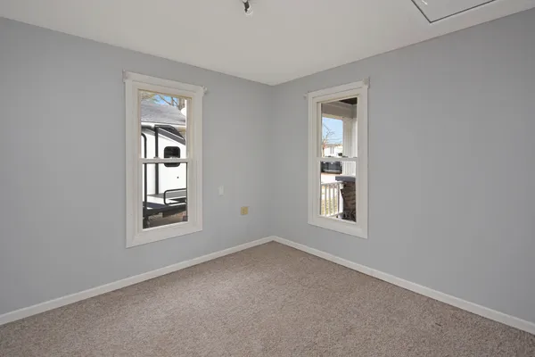 an empty room with windows