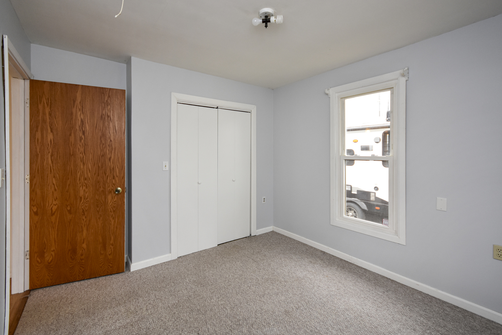615 North Mulberry Street Clinton, IL 61727 - Photo 23 of 40 a view of empty room with windows