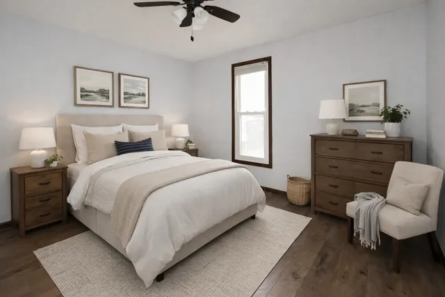 a bedroom with a bed and furniture