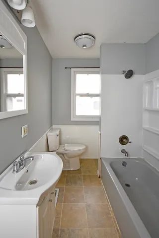 a bathroom with a sink and a bathtub