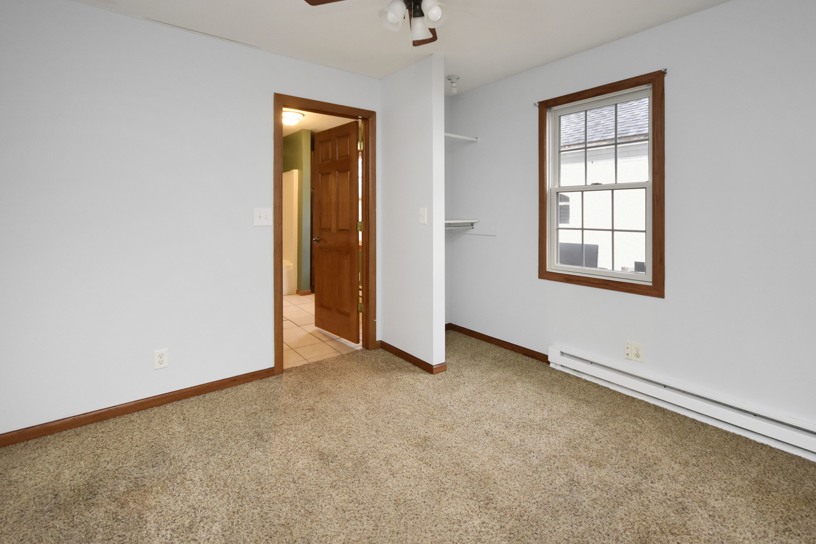 615 North Mulberry Street Clinton, IL 61727 - Photo 31 of 40 an empty room with windows and closet