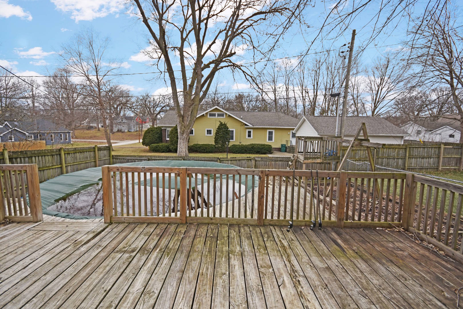 615 North Mulberry Street Clinton, IL 61727 - Photo 37 of 40 a view of a wooden roof with wooden floor and fence