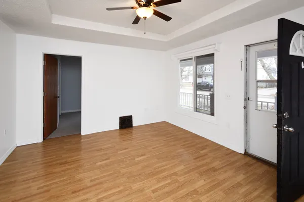 a view of an empty room with a window