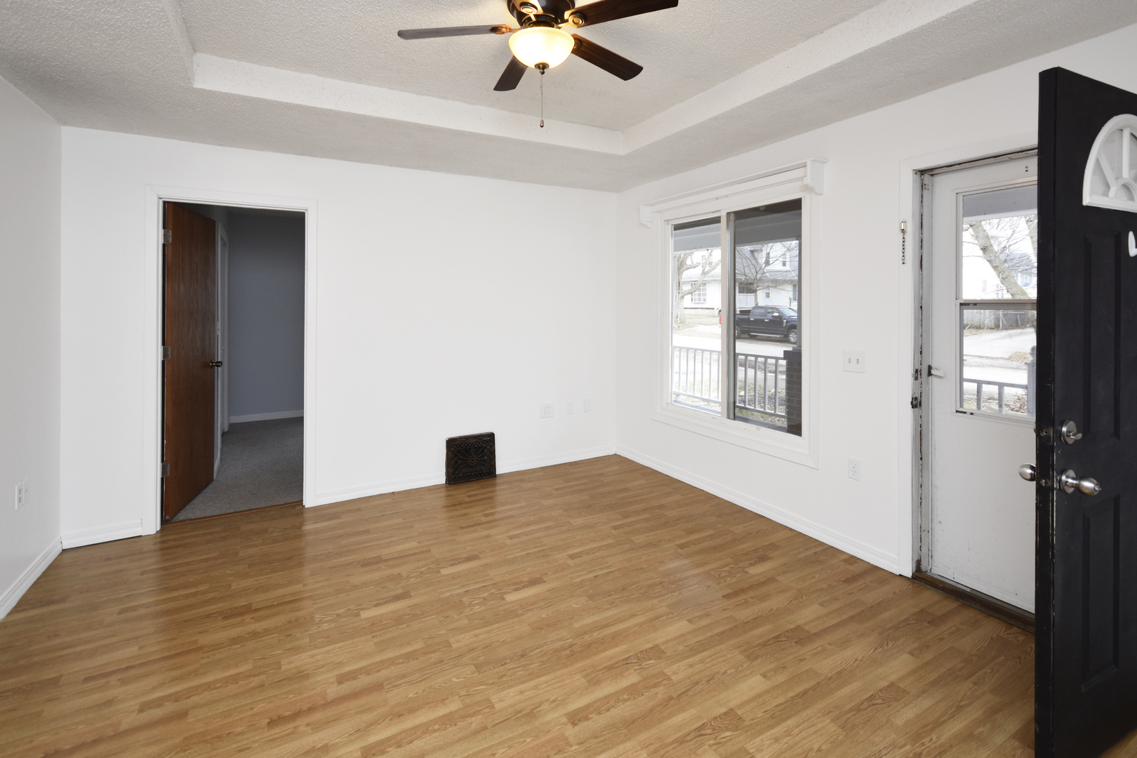 615 North Mulberry Street Clinton, IL 61727 - Photo 5 of 40 a view of an empty room with a window