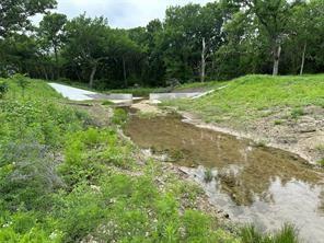 Lot 3 Ranchside Court Itasca, TX 76055 - Photo 4 of 22 a fire hydrant in the middle of a field
